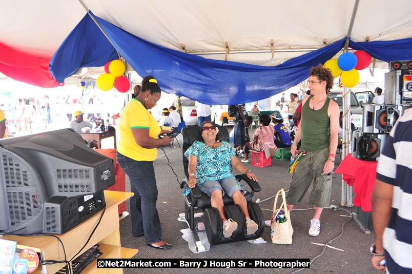 Lucea Cross the Harbour @ Lucea Car Park - All Day Event - Cross the Harbour Swim, Boat Rides, and Entertainment for the Family - Concert Featuring: Bushman, George Nooksl, Little Hero, Bushi One String, Dog Rice and many local Artists - Friday, August 1, 2008 - Lucea, Hanover Jamaica - Photographs by Net2Market.com - Barry J. Hough Sr. Photojournalist/Photograper - Photographs taken with a Nikon D300 - Negril Travel Guide, Negril Jamaica WI - http://www.negriltravelguide.com - info@negriltravelguide.com...!