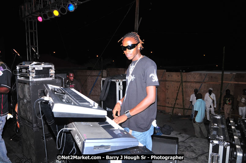 Lucea Cross the Harbour @ Lucea Car Park - All Day Event - Cross the Harbour Swim, Boat Rides, and Entertainment for the Family - Concert Featuring: Bushman, George Nooksl, Little Hero, Bushi One String, Dog Rice and many local Artists - Friday, August 1, 2008 - Lucea, Hanover Jamaica - Photographs by Net2Market.com - Barry J. Hough Sr. Photojournalist/Photograper - Photographs taken with a Nikon D300 - Negril Travel Guide, Negril Jamaica WI - http://www.negriltravelguide.com - info@negriltravelguide.com...!