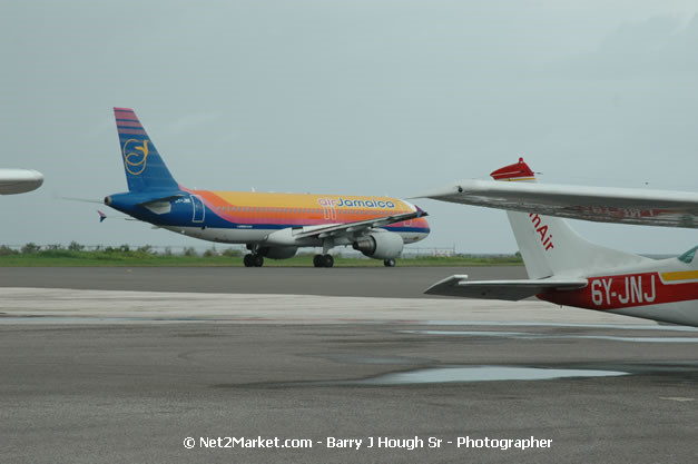 Air Jamaica Airline - Landing & Take Off - MBJ Airports Limited - Sangster International Airport - Domestic Terminal - Montego Bay, St James, Jamaica W.I. - MBJ Limited - Transforming Sangster International Airport into a world class facility - Photographs by Net2Market.com - Negril Travel Guide, Negril Jamaica WI - http://www.negriltravelguide.com - info@negriltravelguide.com...!