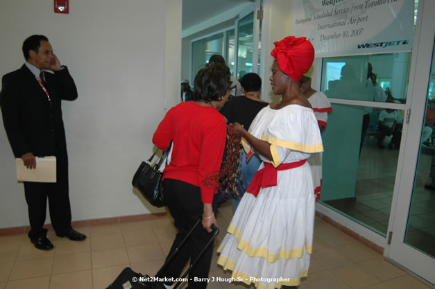 MBJ Airports Limited Welcomes WestJet Airlines - Inaugural Scheduled Service From Toronto Pearsons International Airport - Monday, December 10, 2007 - Sangster International Airport - MBJ Airports Limited, Montego Bay, Jamaica W.I. - Photographs by Net2Market.com - Barry J. Hough Sr, Photographer - Negril Travel Guide, Negril Jamaica WI - http://www.negriltravelguide.com - info@negriltravelguide.com...!