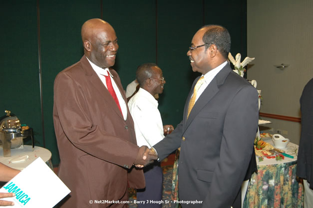 Red Cap Porters Awards - Minister of Tourism, Hon. Edmund Bartlett - Director of Tourism, Basil Smith - Friday, December 14, 2007 - Holiday Inn Sunspree, Montego Bay, Jamaica W.I. - Photographs by Net2Market.com - Barry J. Hough Sr, Photographer - Negril Travel Guide, Negril Jamaica WI - http://www.negriltravelguide.com - info@negriltravelguide.com...!