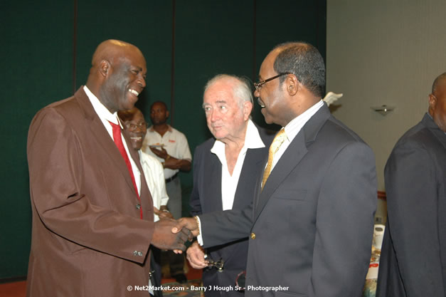 Red Cap Porters Awards - Minister of Tourism, Hon. Edmund Bartlett - Director of Tourism, Basil Smith - Friday, December 14, 2007 - Holiday Inn Sunspree, Montego Bay, Jamaica W.I. - Photographs by Net2Market.com - Barry J. Hough Sr, Photographer - Negril Travel Guide, Negril Jamaica WI - http://www.negriltravelguide.com - info@negriltravelguide.com...!