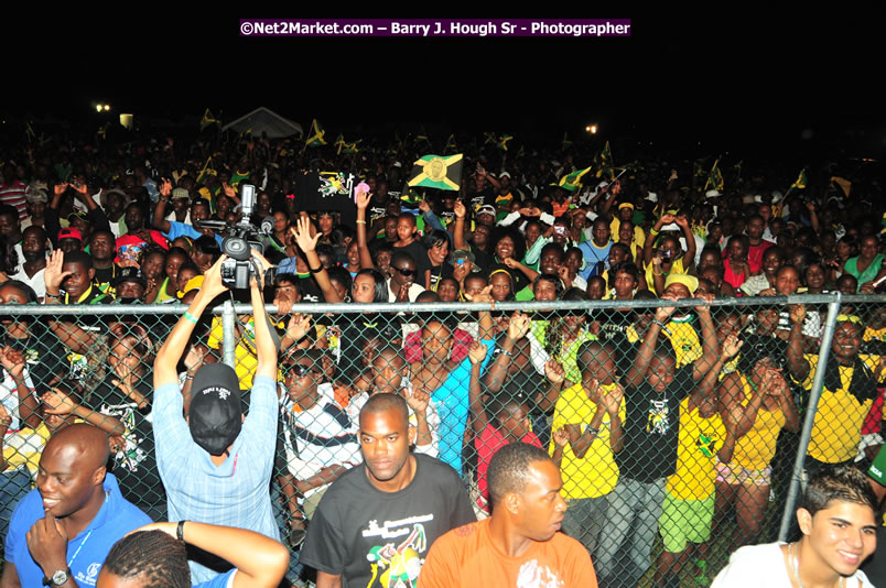 Usain Bolt of Jamaica - The Fastest Man In The World  - Usain Bolt Homecoming Celebrations Concert at the William Knibb High School Play Field, Trelawny - Ice, Ding Dong, Ravers Clavers, D'Angel, Voicemail, RDX and Dancers, Wayne Marshall, Tammi Chynn, Bugle, Nero, Tanya Stephens, Richie Spice, Kip Rich,and Shaggy - Photographs by Net2Market.com - Barry J. Hough Sr. Photojournalist/Photograper - Photographs taken with a Nikon D300 - Negril Travel Guide, Negril Jamaica WI - http://www.negriltravelguide.com - info@negriltravelguide.com...!