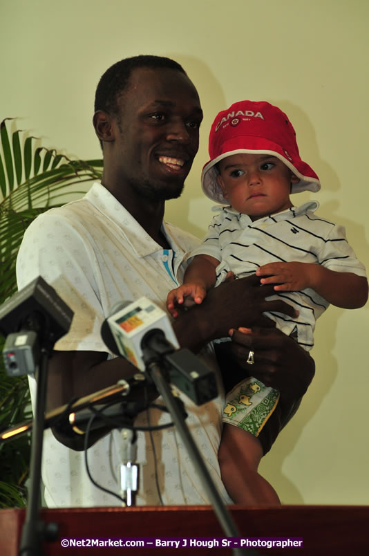 Usain Bolt of Jamaica - The Fastest Man In The World  - Usain Bolt Homecoming Celebrations - Press Conference at the Grand Bahia Principe &amp; Sherwood Content - Waldensia Primary School - Photographs by Net2Market.com - Barry J. Hough Sr. Photojournalist/Photograper - Photographs taken with a Nikon D300 - Negril Travel Guide, Negril Jamaica WI - http://www.negriltravelguide.com - info@negriltravelguide.com...!